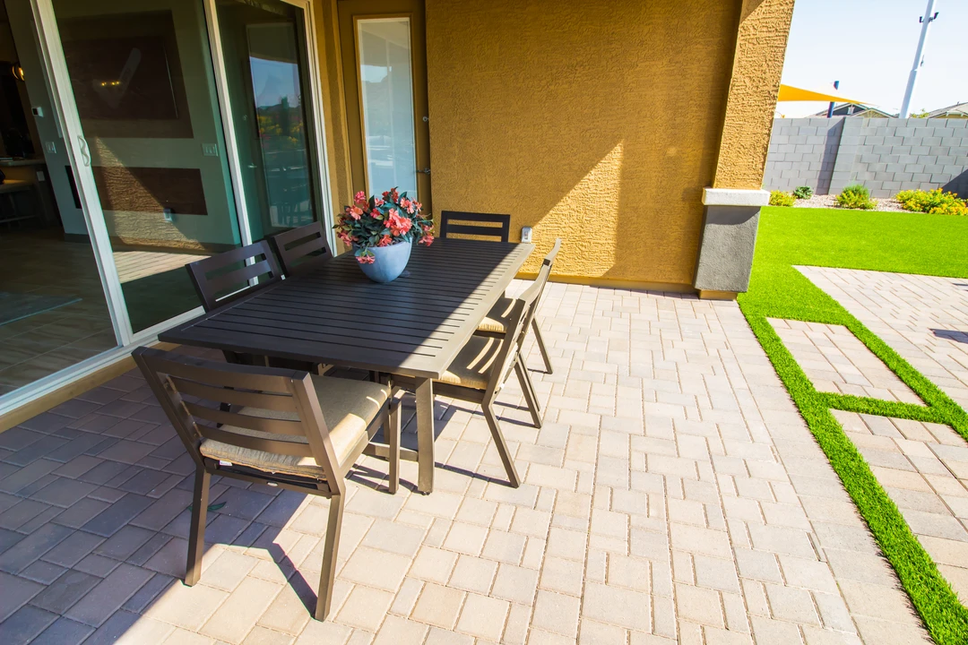 Close up view of circular stone paver pattern commonly used in custom patios for texture and visual interest.