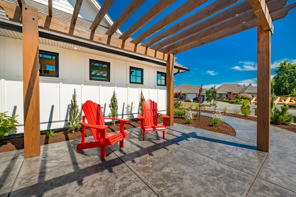 Finished patio with pergola and seating built on a solid foundation for lasting outdoor stability.